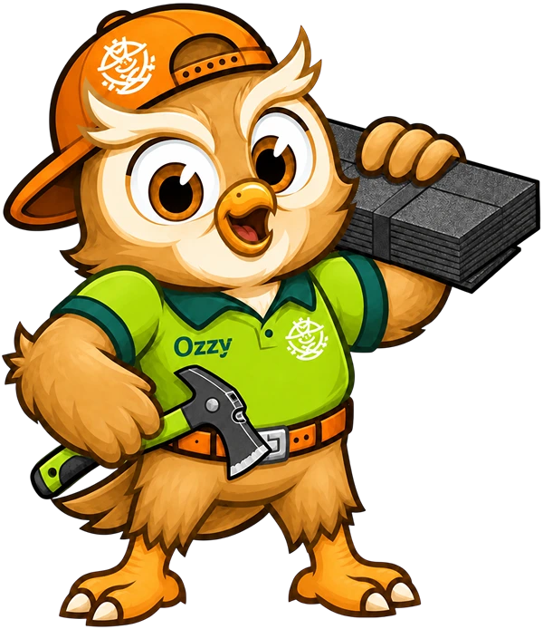 Ozzy, the True Nest owl mascot, holding a hammer and roofing shingles